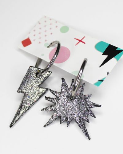 Aretes Rayo Boom purpurina plata